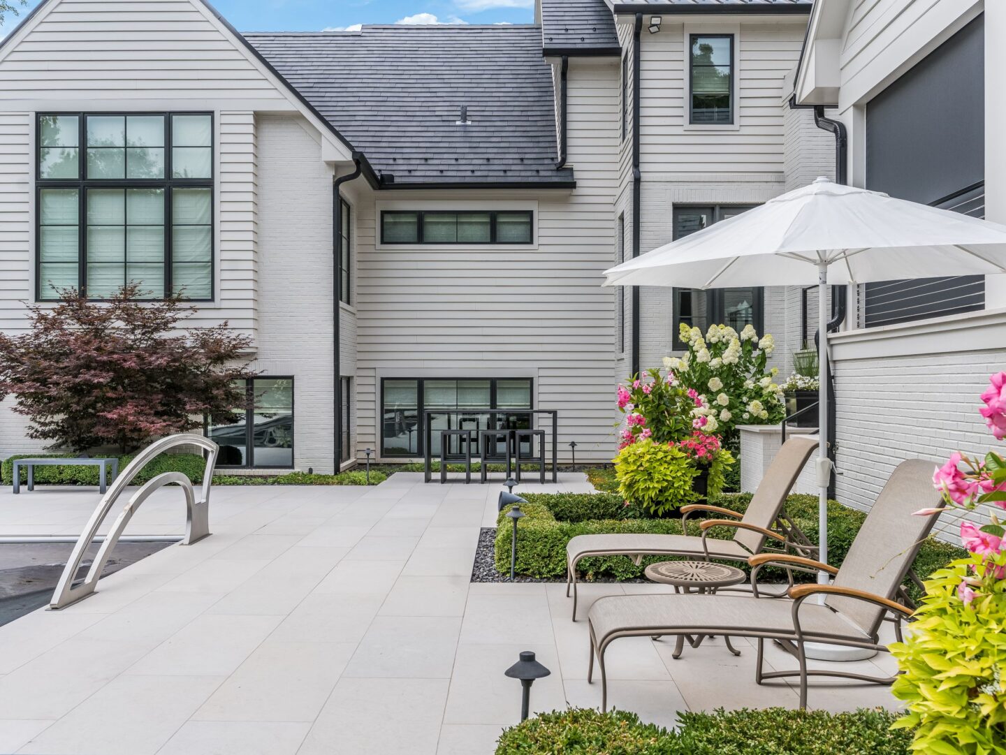 Composite deck with pergola overhead built by Kaizenscapes in North Georgia