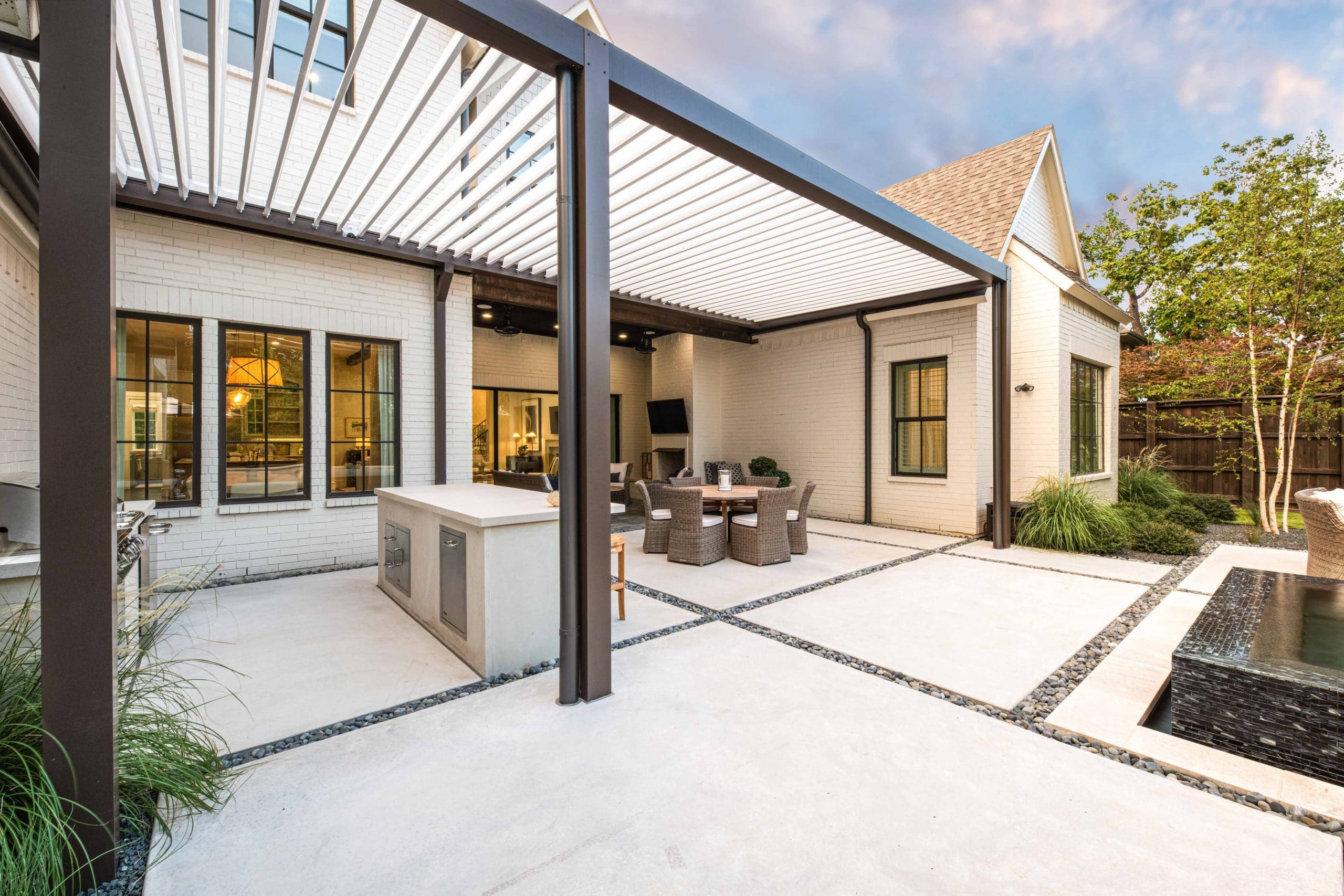 Freestanding pergola with engineered footings in Woodstock Georgia by Kaizenscapes