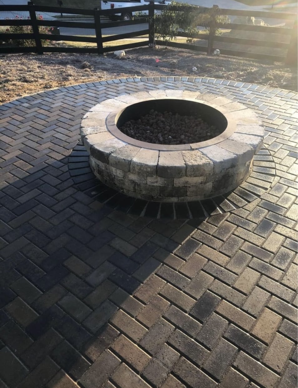 Masonry outdoor fireplace built by Kaizenscapes in Canton Georgia