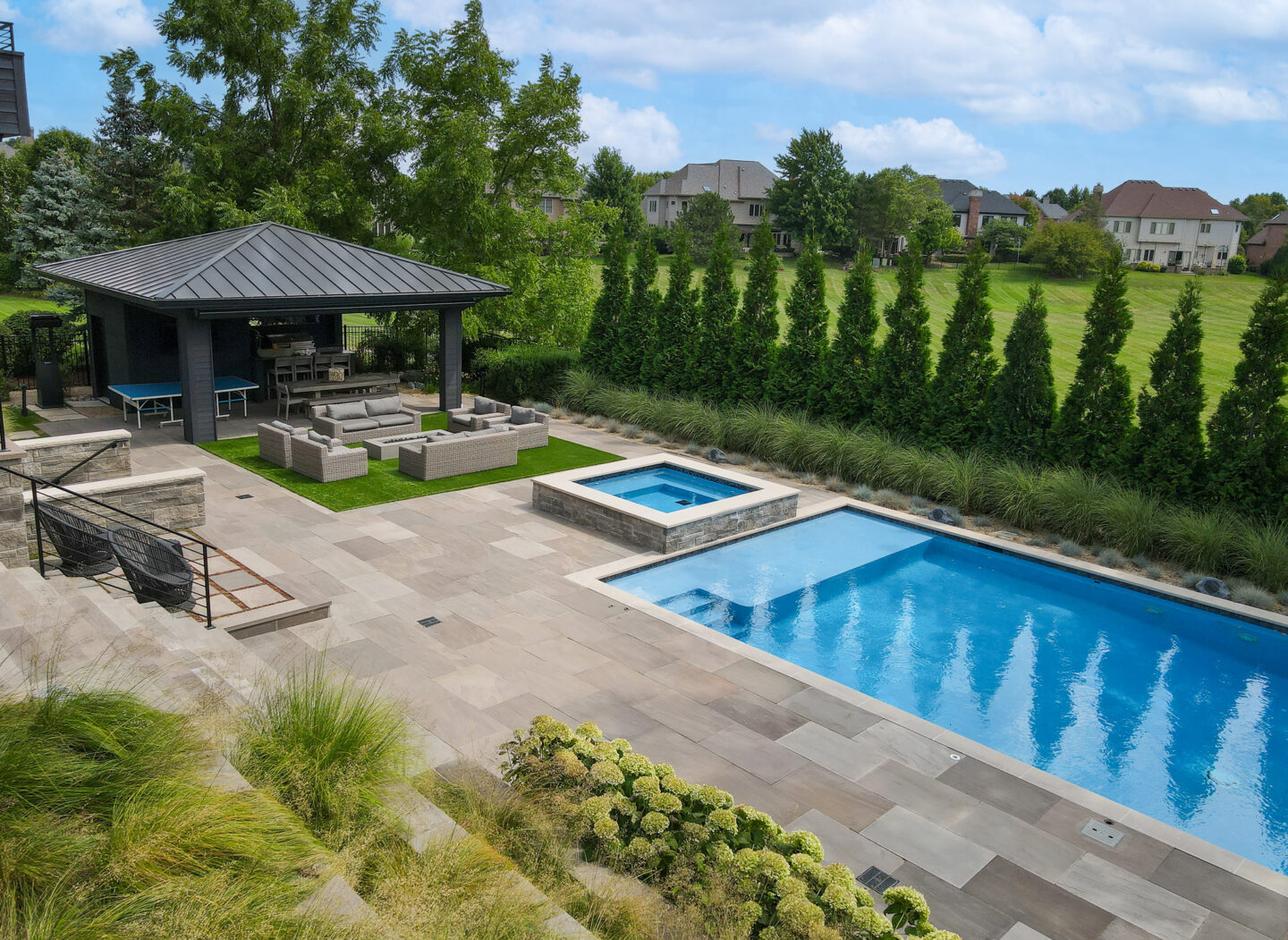 Pool deck hardscaping project completed by Kaizenscapes in Canton Georgia