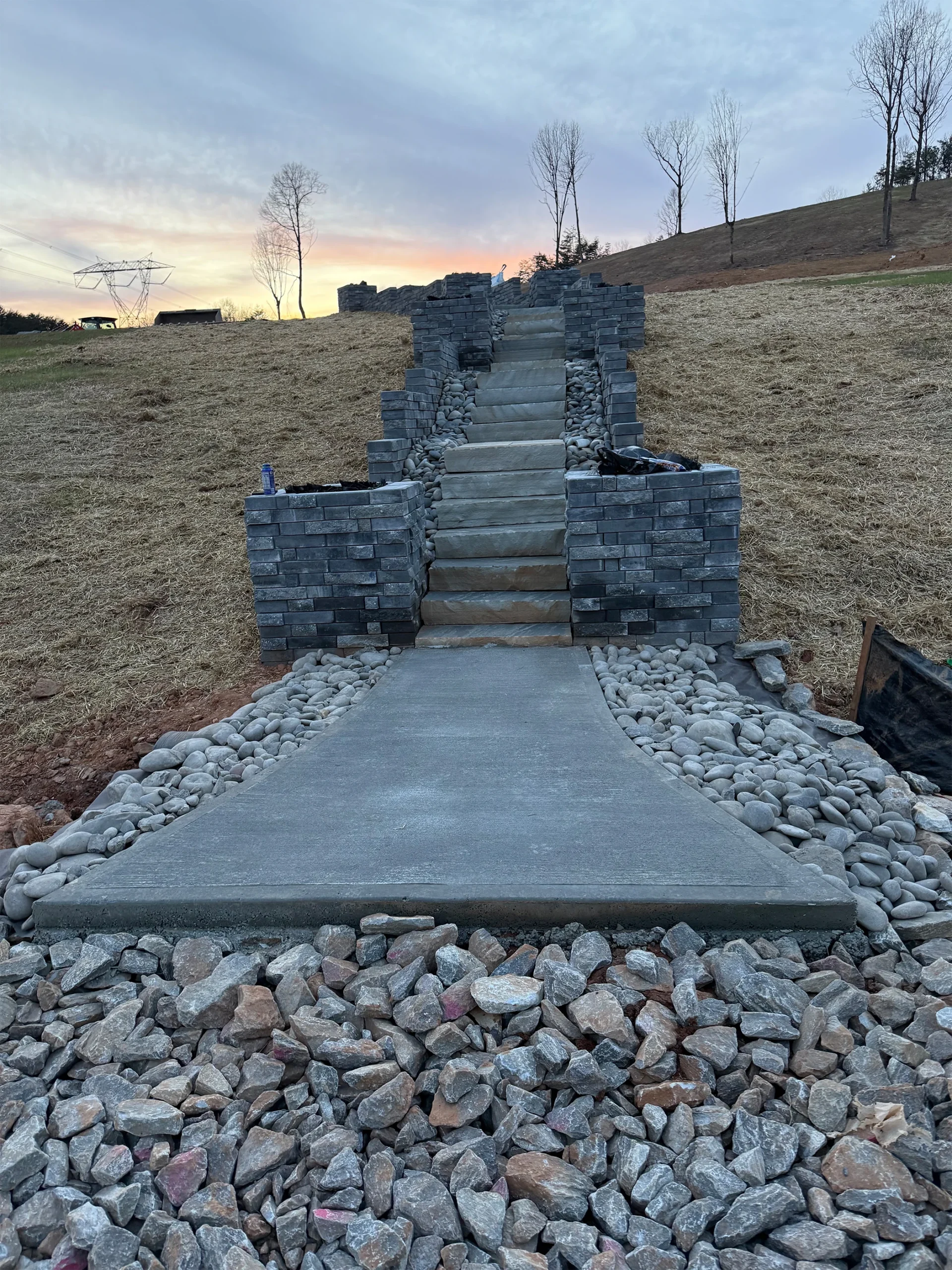 Why Milton Homeowners Are Adding Retaining Walls to Reclaim Sloped Lots — What the Transformation Looks Like