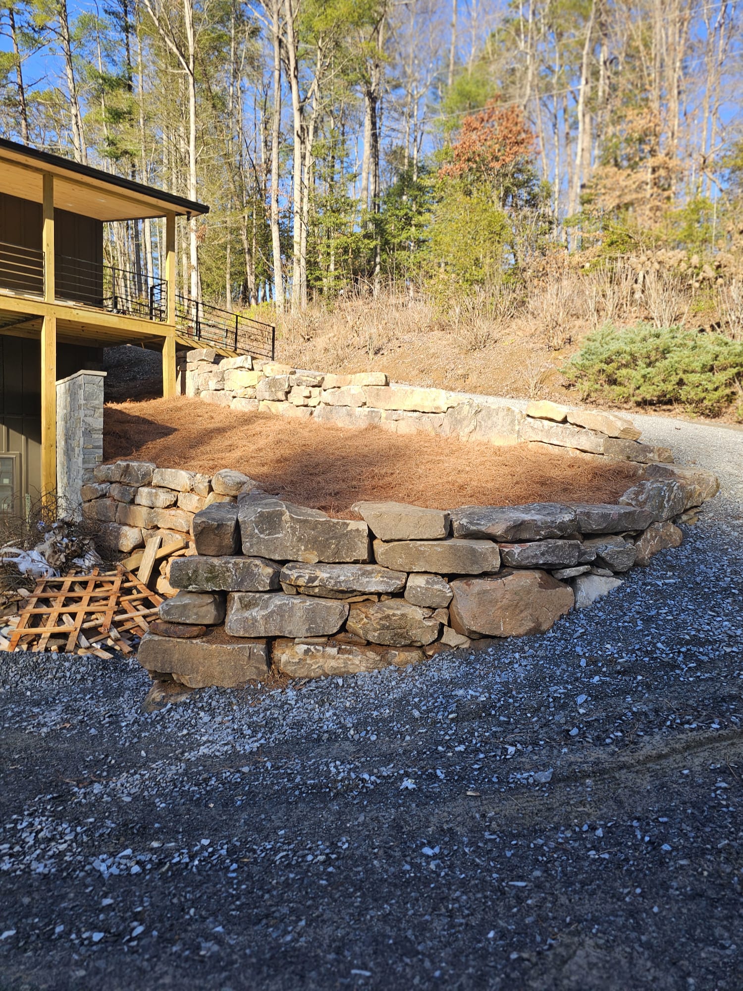 Retaining wall with erosion control on sloped yard in Canton GA