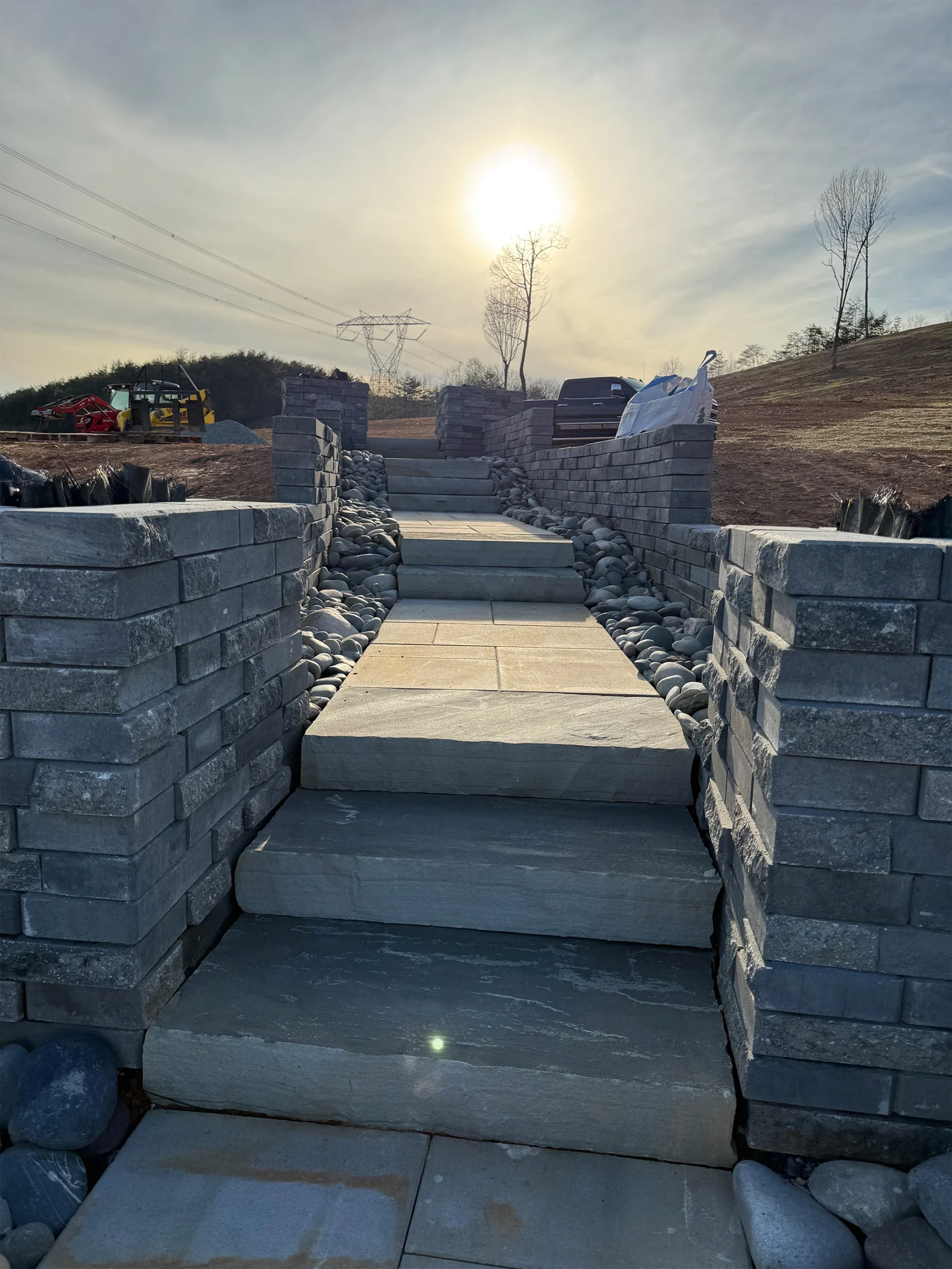Architectural masonry entry columns at stone staircase base in Canton Georgia by Kaizenscapes