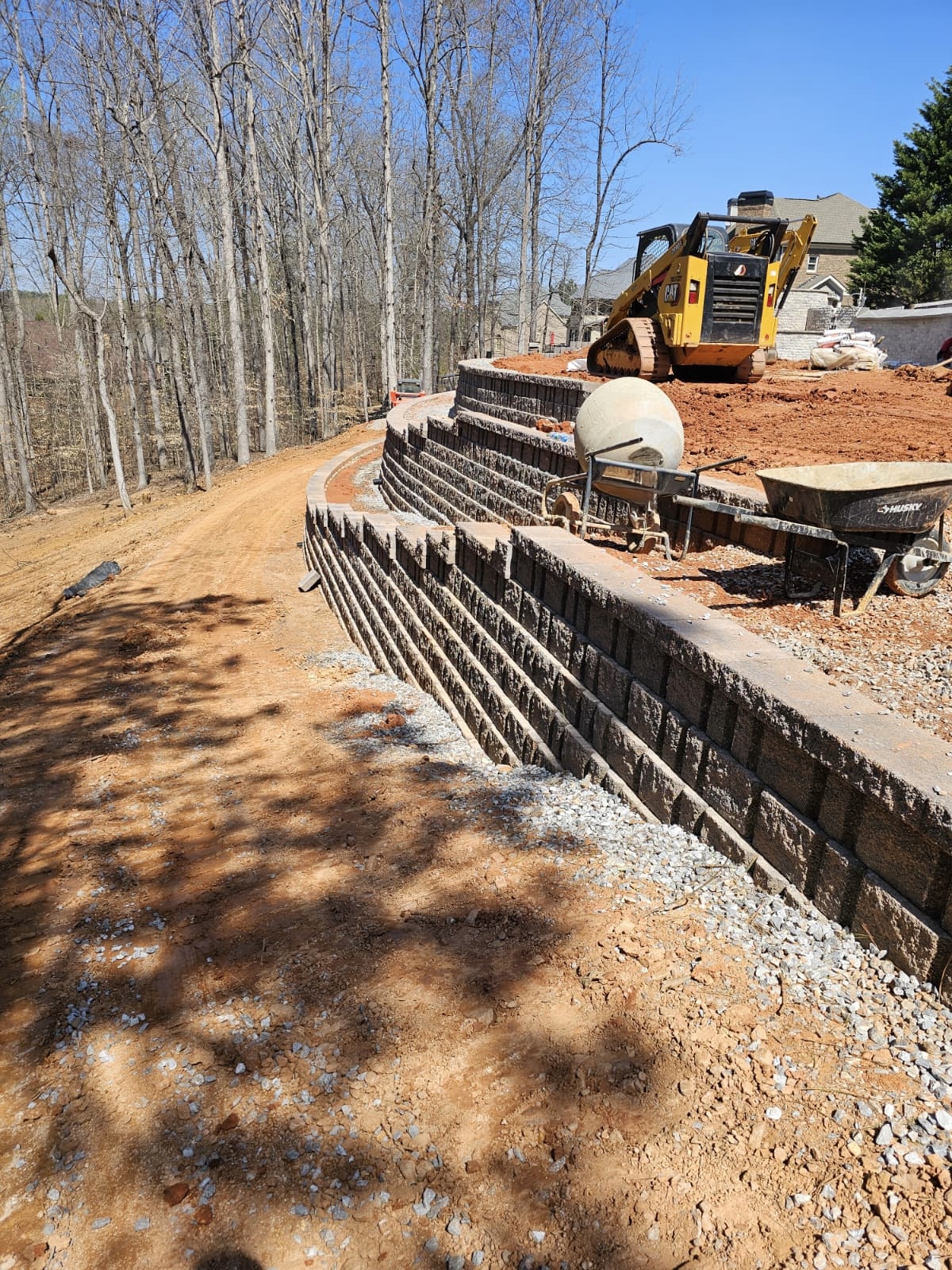 Block retaining wall installation in Canton GA by Kaizenscapes