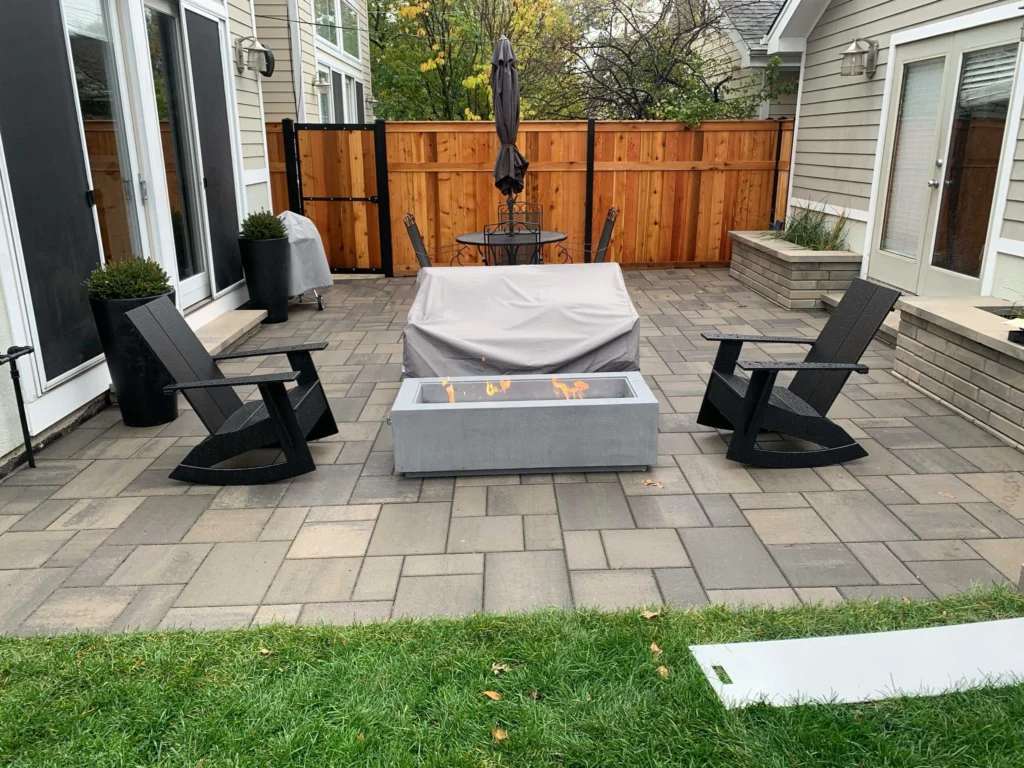 Covered porch integrated with extended paver patio - Buford, GA hardscaping contractor | Viral Spark Marketing