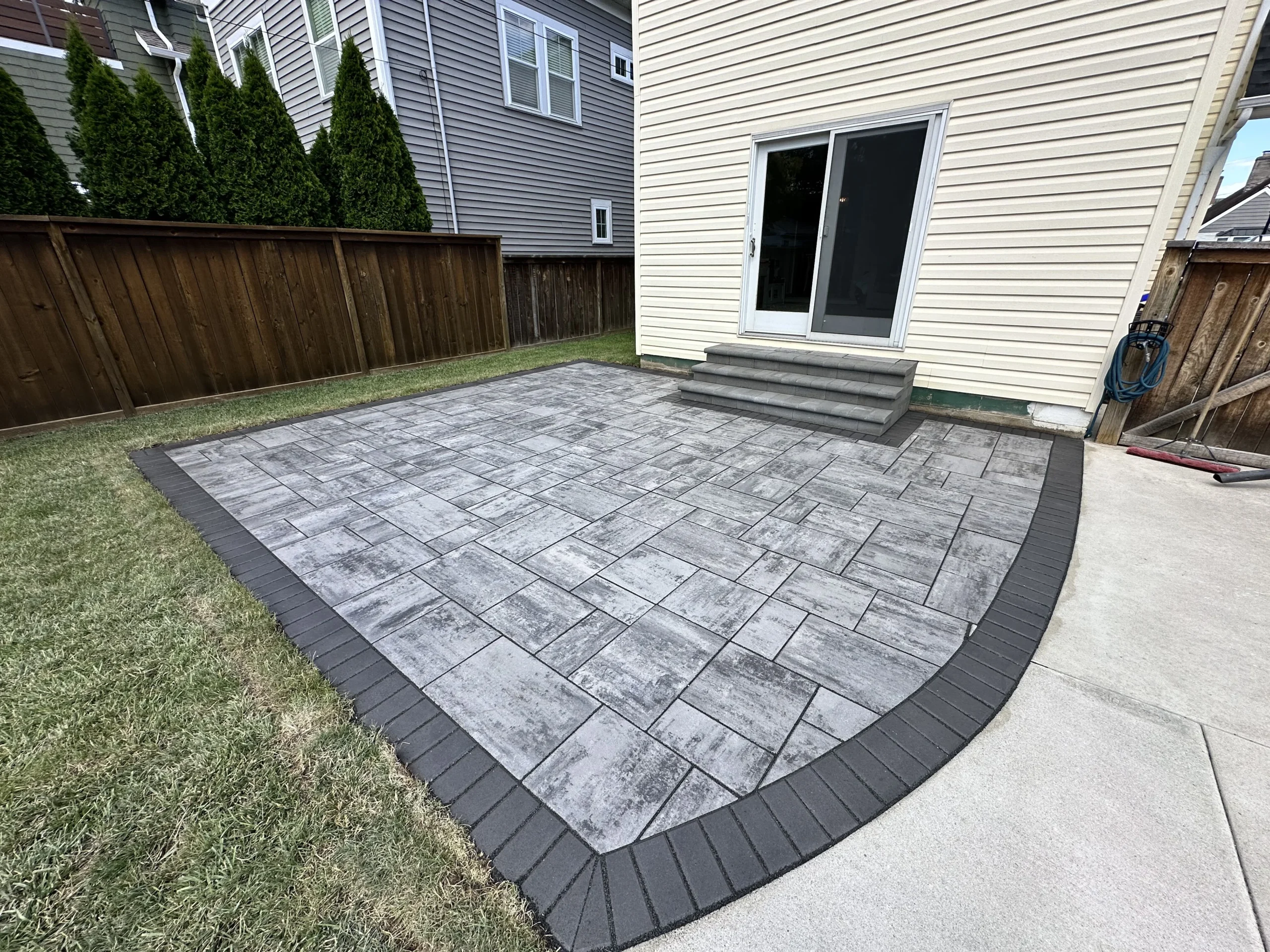 Social media management for landscapers in Cumming — Forsyth County hardscape backyard with paver patio and pergola