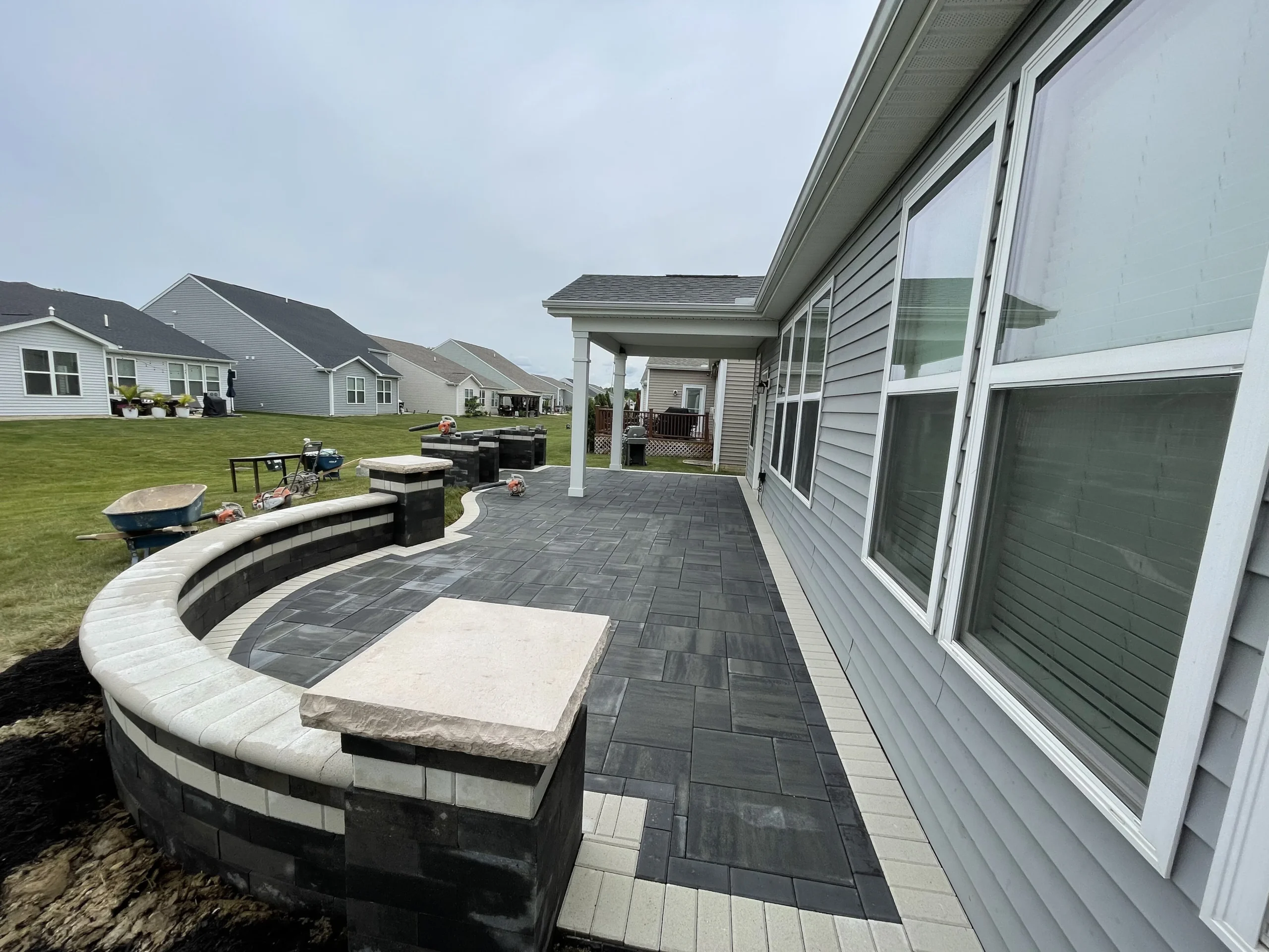 Finished hardscaping project with natural stone steps and garden beds — Duluth GA