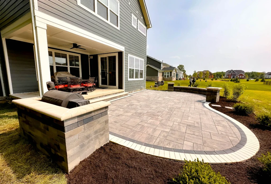 Backyard hardscape with fire feature and lounge area - Kennesaw, GA hardscaping contractor | Viral Spark Marketing