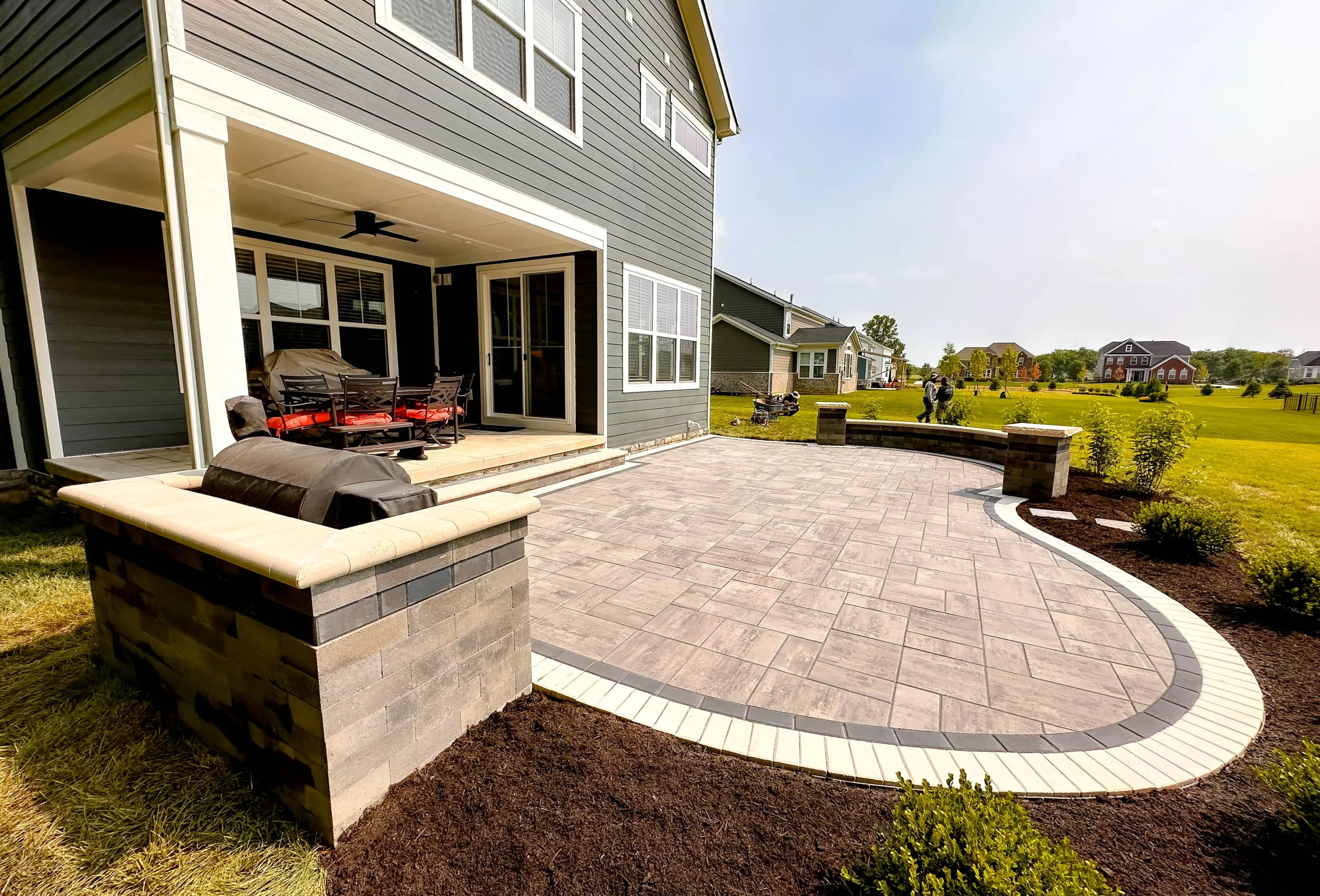 Finished paver patio and outdoor living space by Kennesaw landscaper serving Cameron Forest and Shiloh Valley