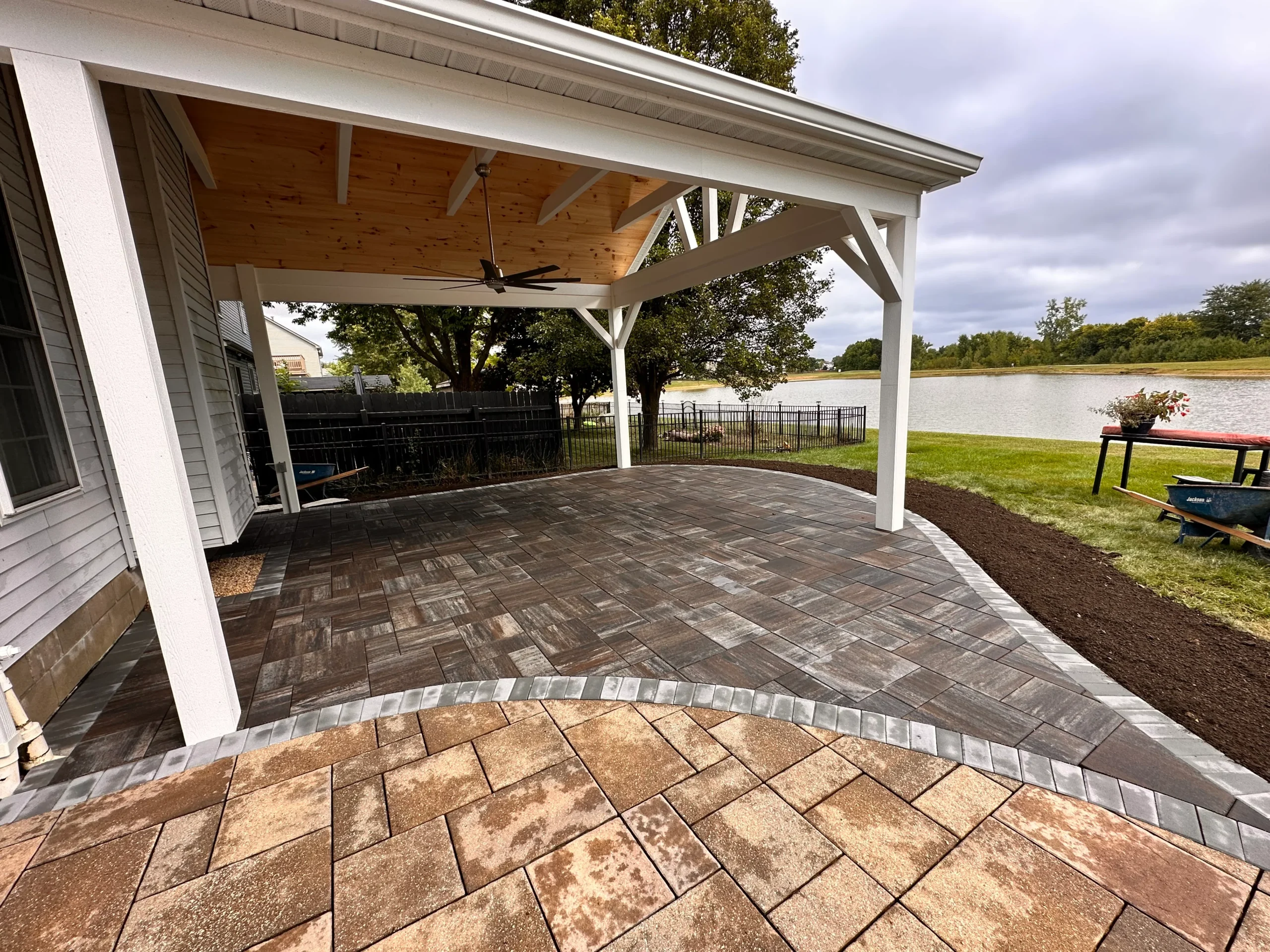 Curved stone walkway and garden design on a Milton estate property
