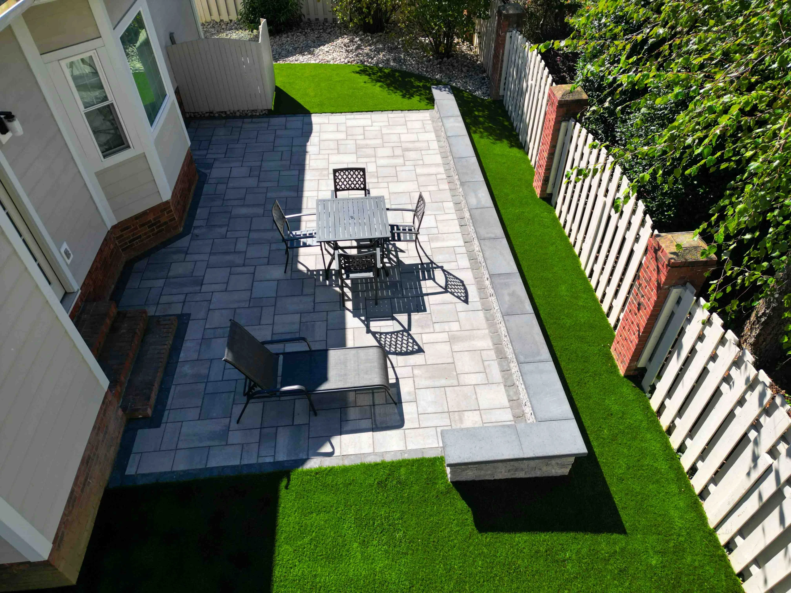 Roswell hardscape with retaining wall and outdoor lighting