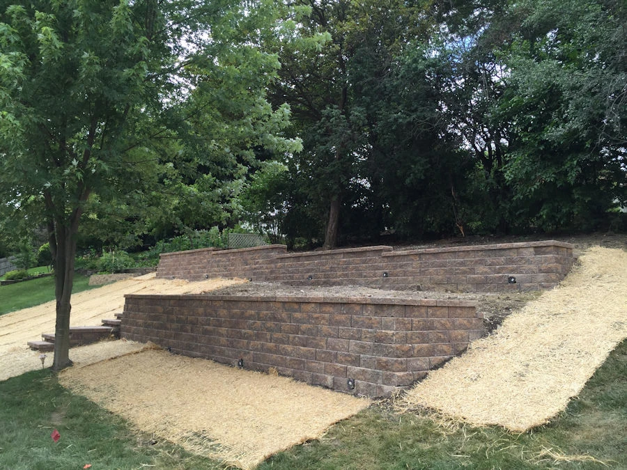 Smyrna landscape design project with retaining wall and lighting