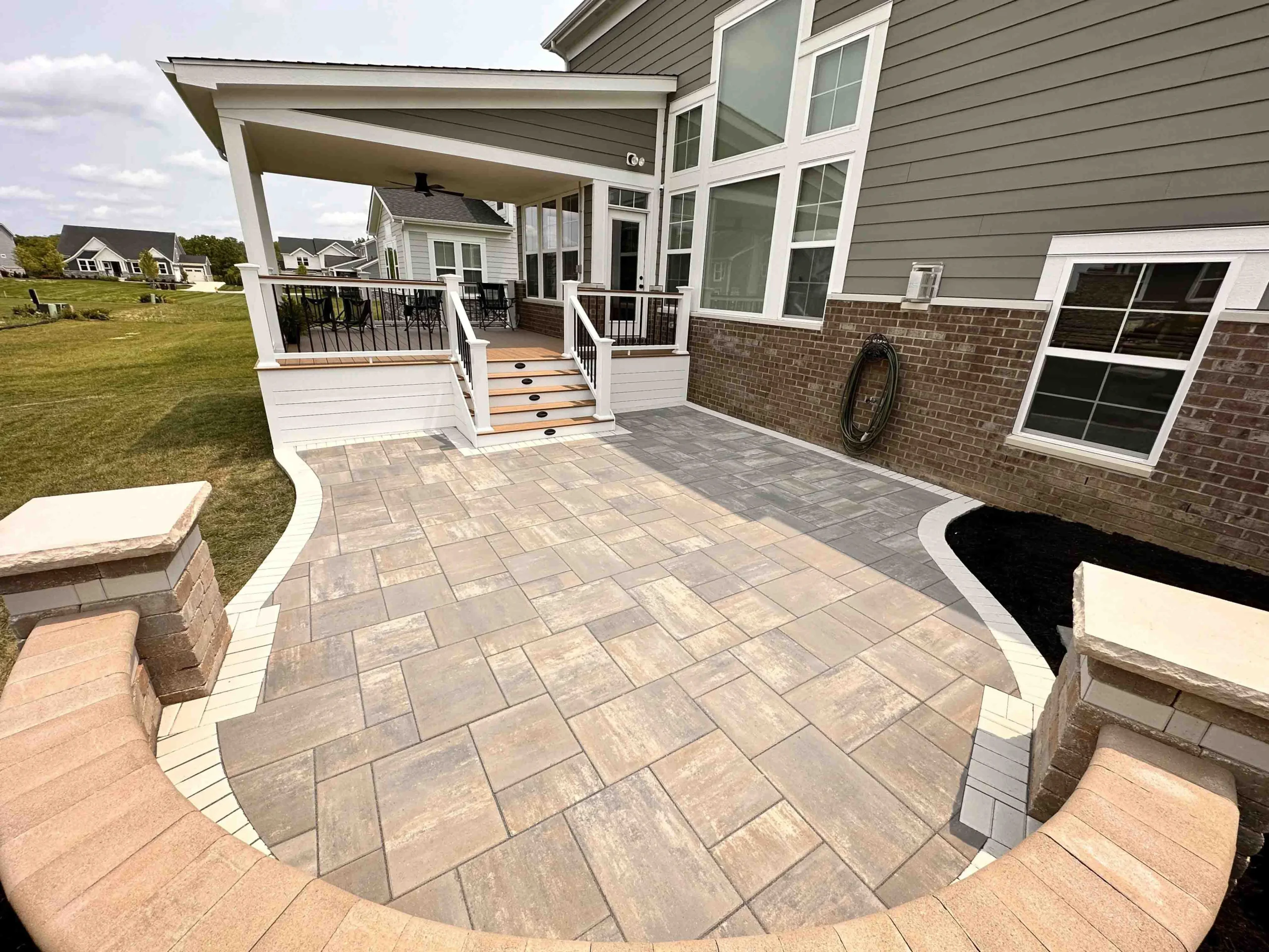 Smyrna outdoor patio with seat wall and modern lighting Cobb County