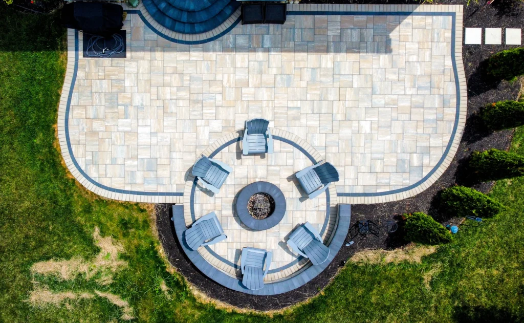 Stamped concrete patio with surrounding landscape - Suwanee, GA hardscaping contractor | Viral Spark Marketing