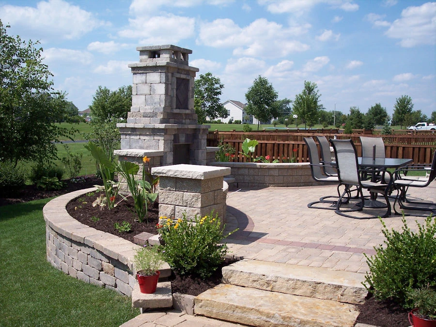 Suwanee outdoor fire feature with stone patio and seating