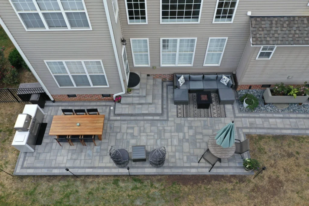 Outdoor living area with paver patio and pergola - Suwanee, GA hardscaping contractor | Viral Spark Marketing