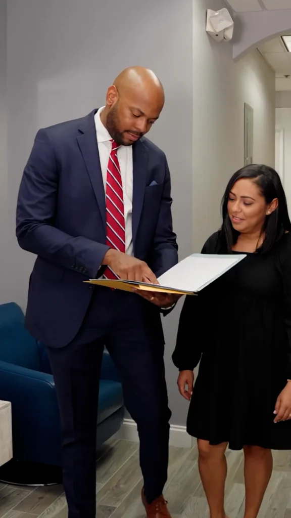 Attorney working with case documents and laptop - Roswell, GA personal injury attorney | Viral Spark Marketing