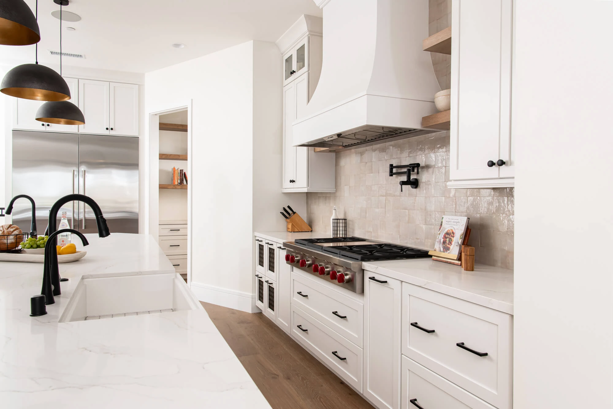 Modern Alpharetta primary bedroom suite with vaulted ceilings and en-suite bath