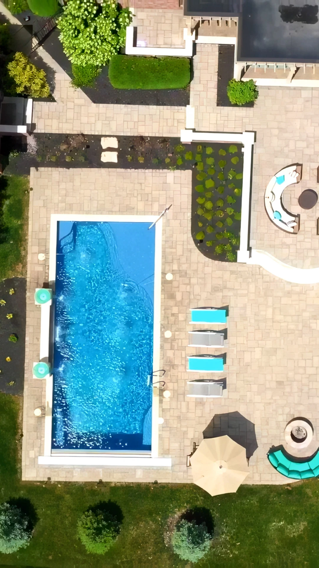 Aerial view of a luxury rectangular pool build in Cumming, Georgia