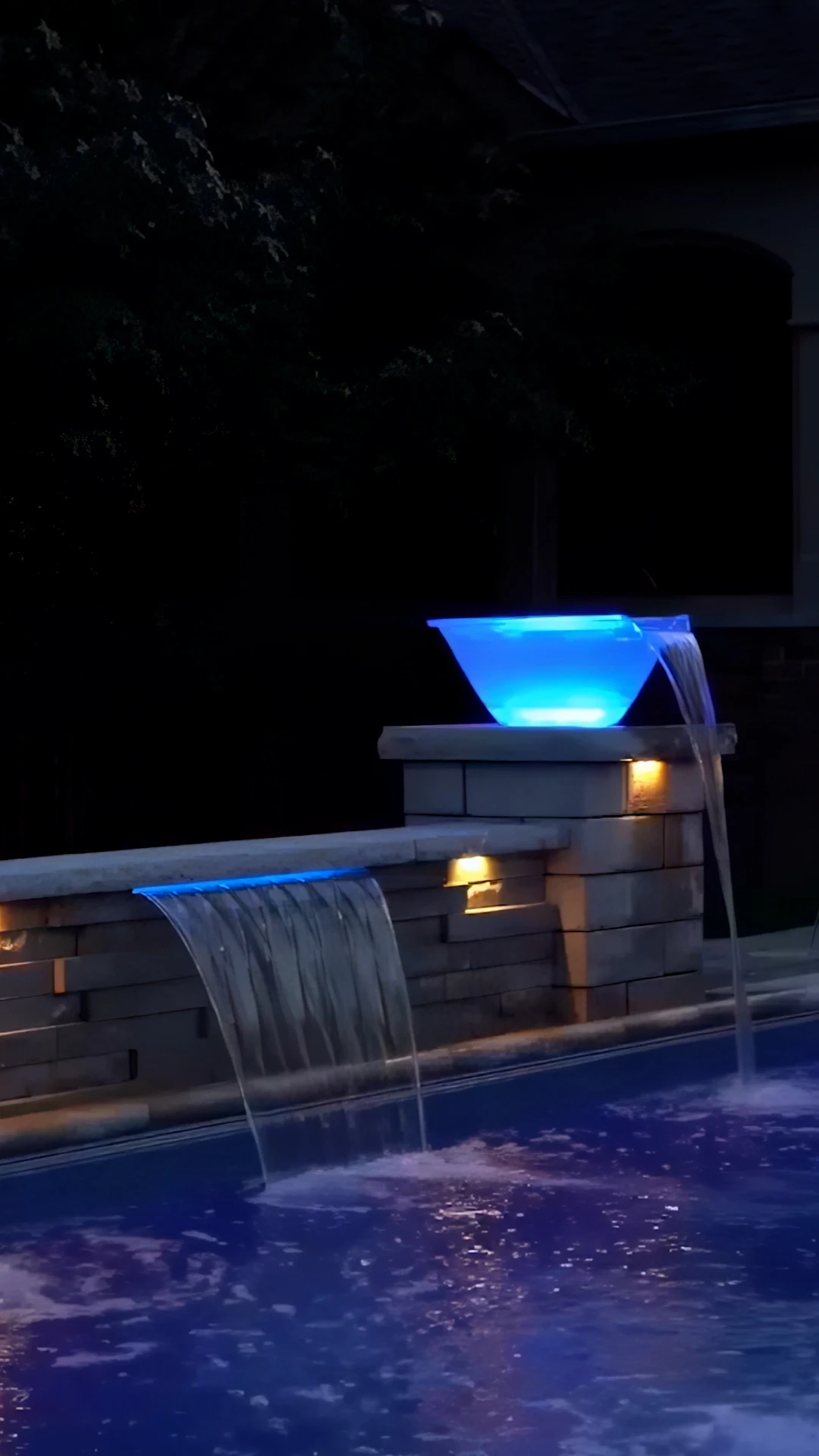 Sunset view of completed Johns Creek pool with outdoor kitchen and lounge
