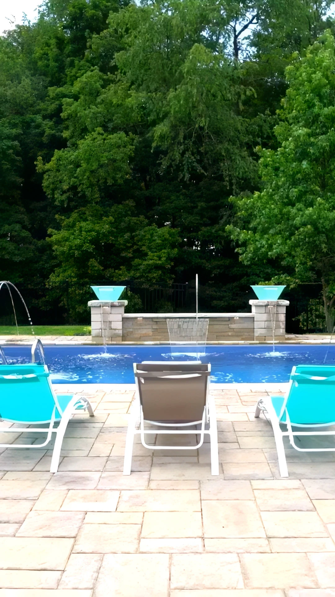 Finished luxury pool with outdoor living area at Johns Creek GA estate home