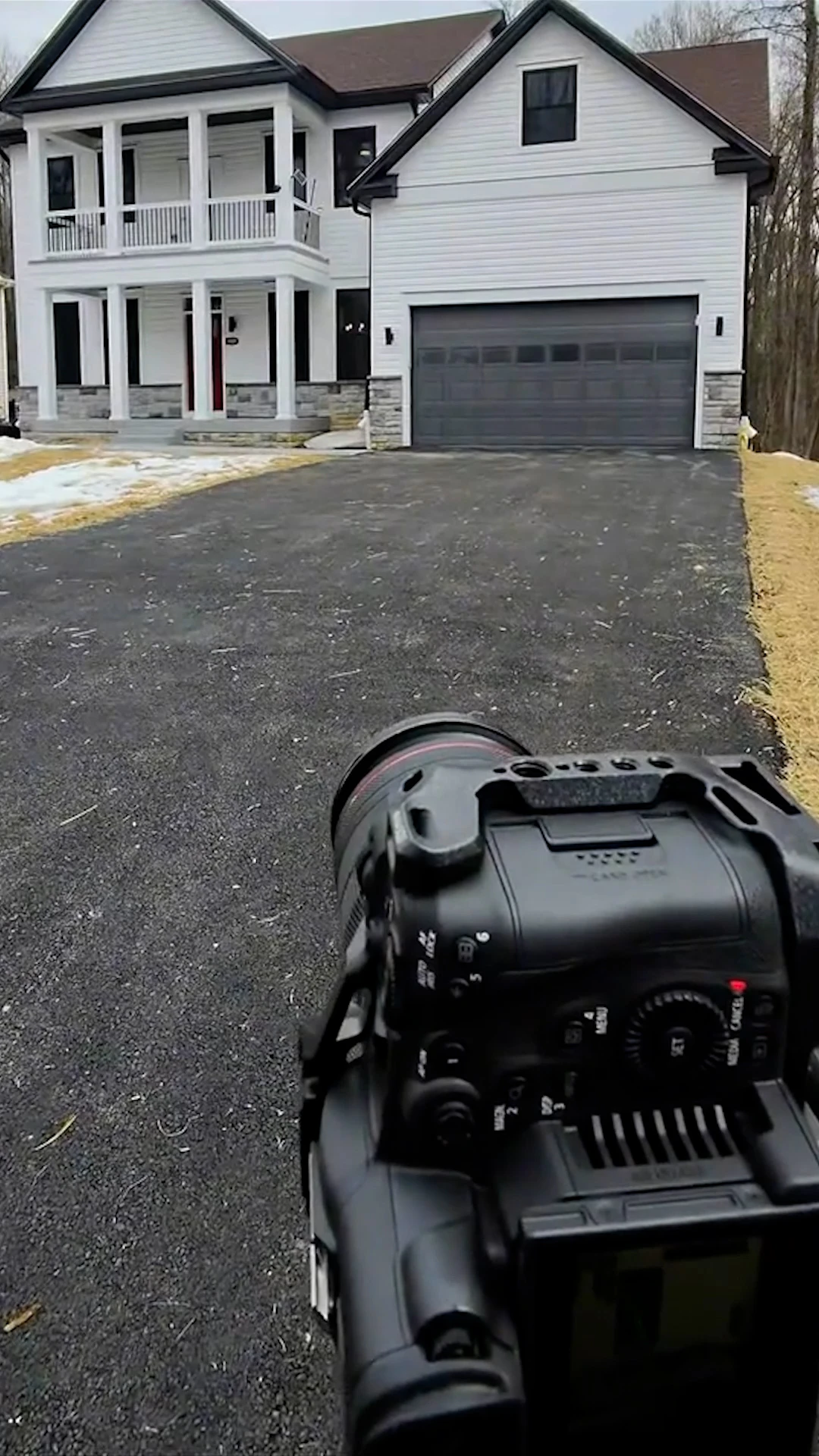 Behind-the-scenes drone setup at a Johns Creek custom-builder content shoot