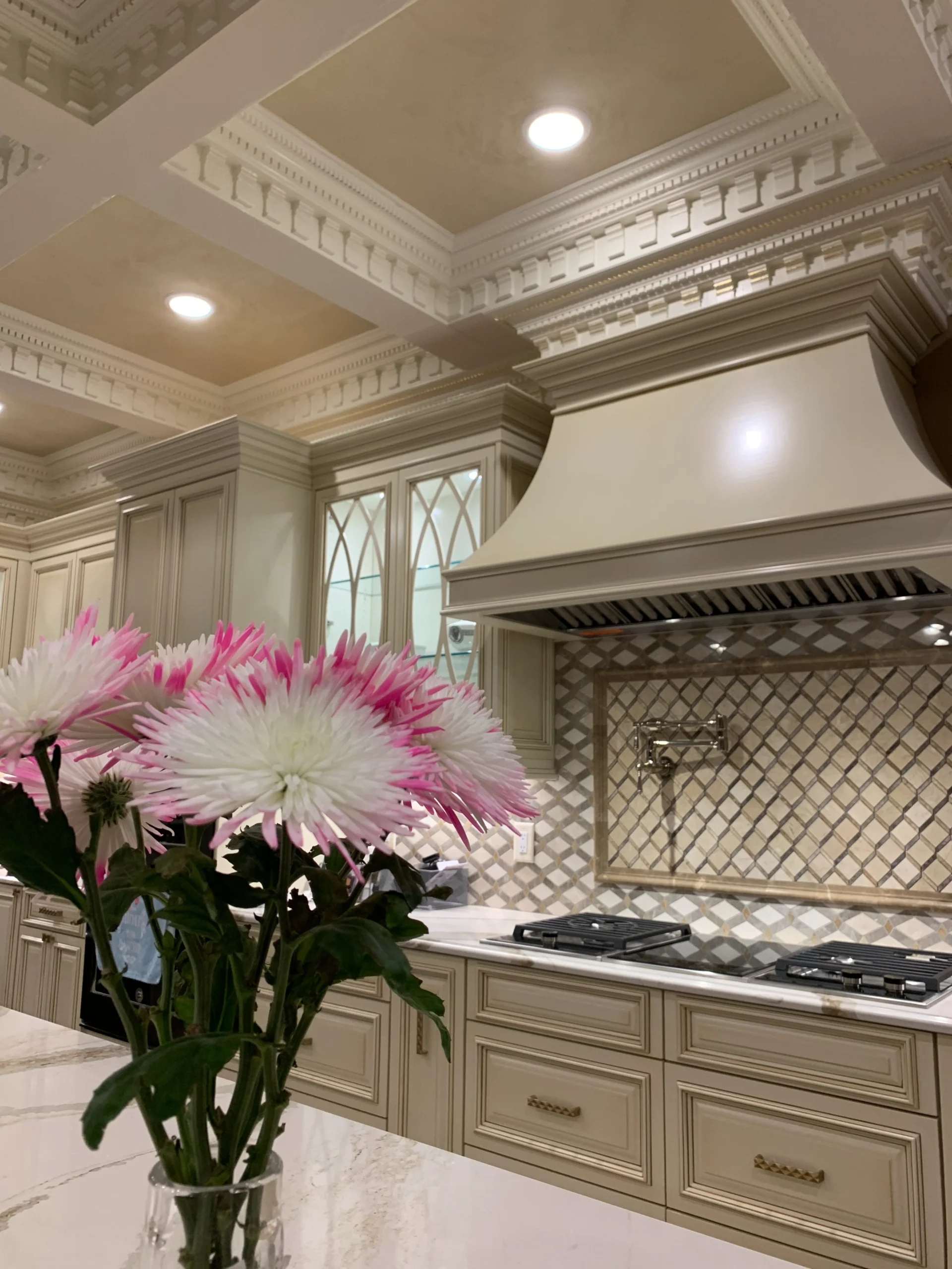 Kennesaw custom home builder completed build showing custom kitchen with island and open floor plan near Bells Ferry expansion corridor