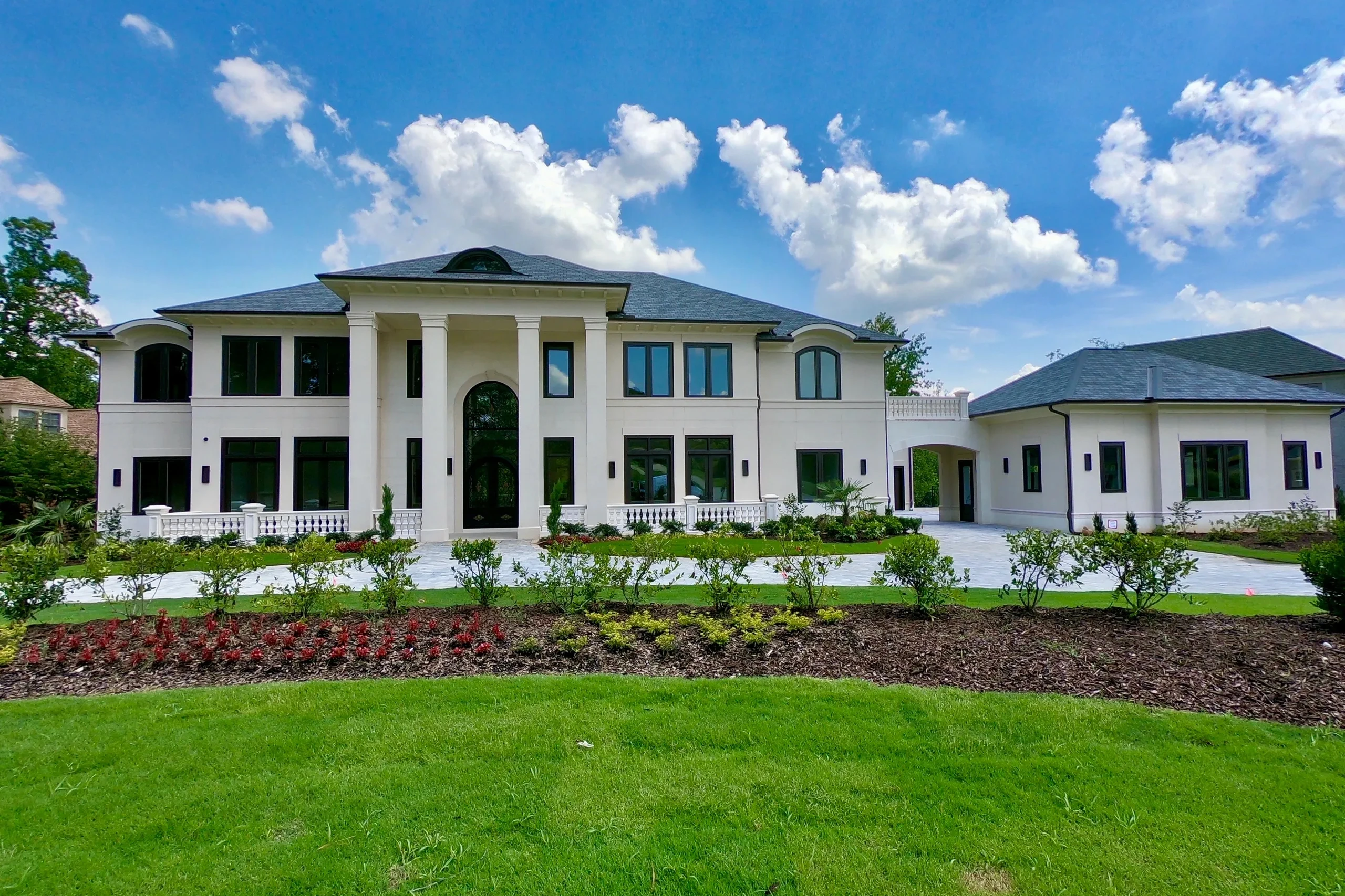 Lead generation for custom home builders in Kennesaw — $3M+ Bentwater estate exterior at sunset