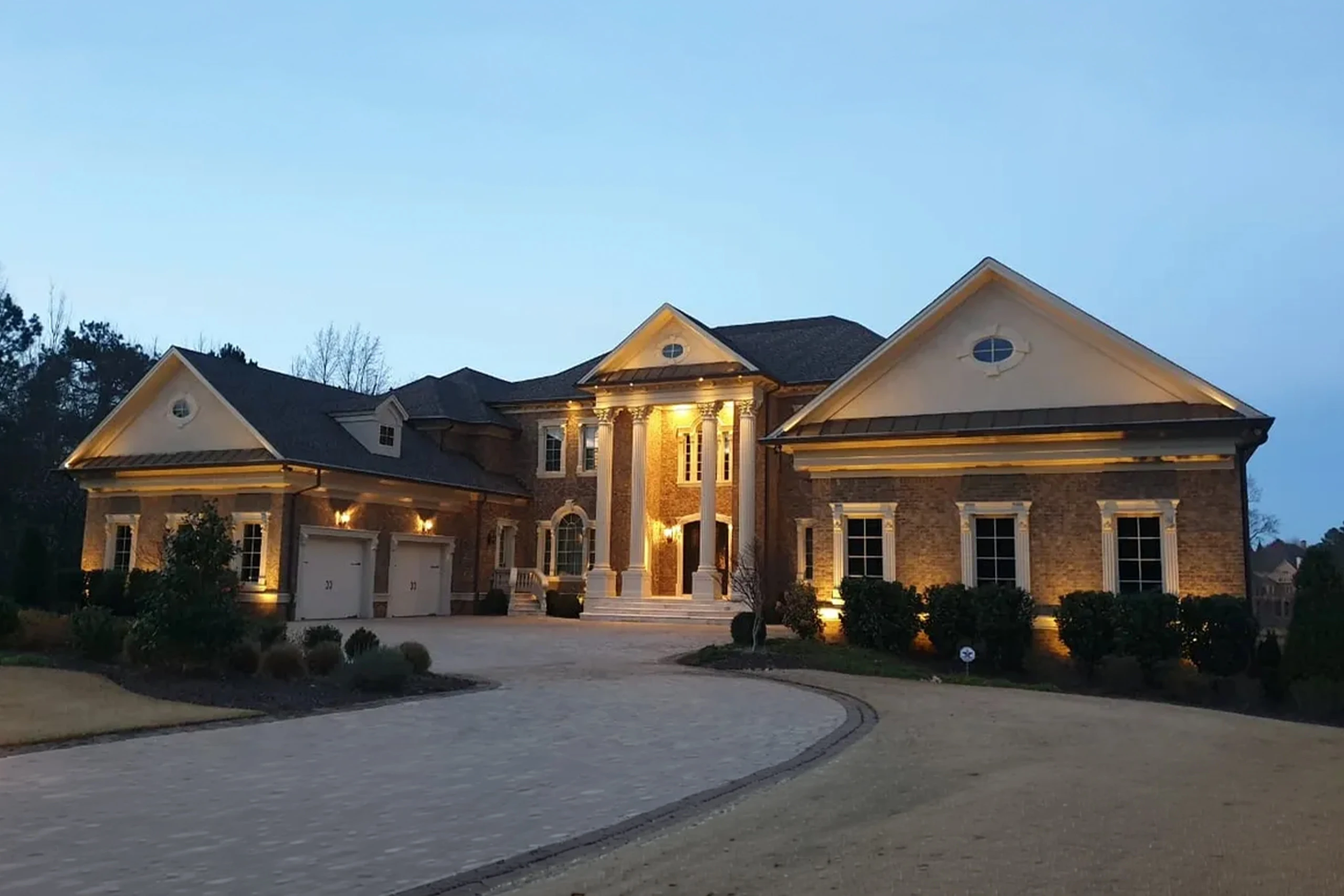 Luxury custom home twilight exterior West Cobb Marietta GA