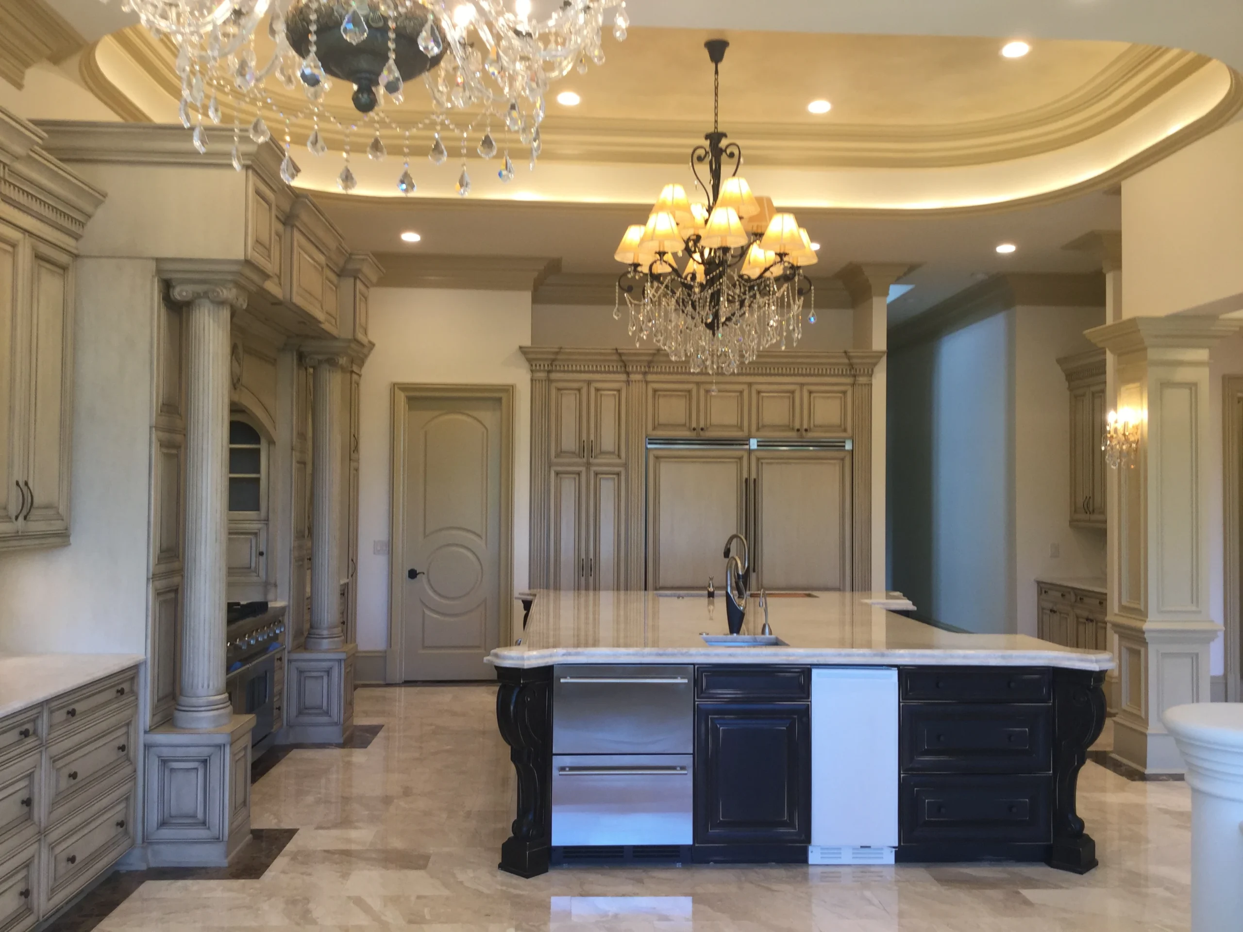 Suwanee custom home with stone exterior and large entry