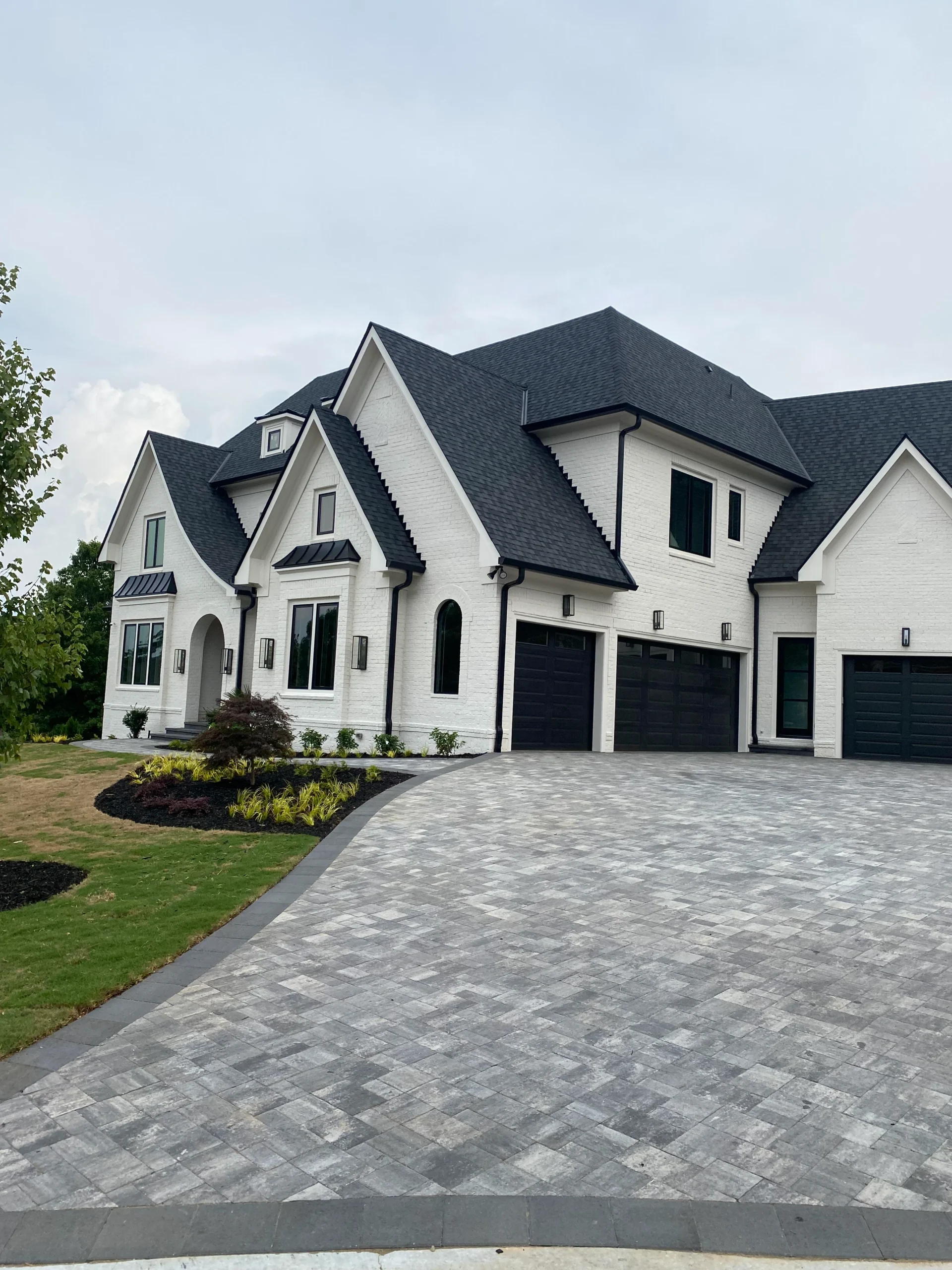 Suwanee custom home rear elevation with covered patio and outdoor living