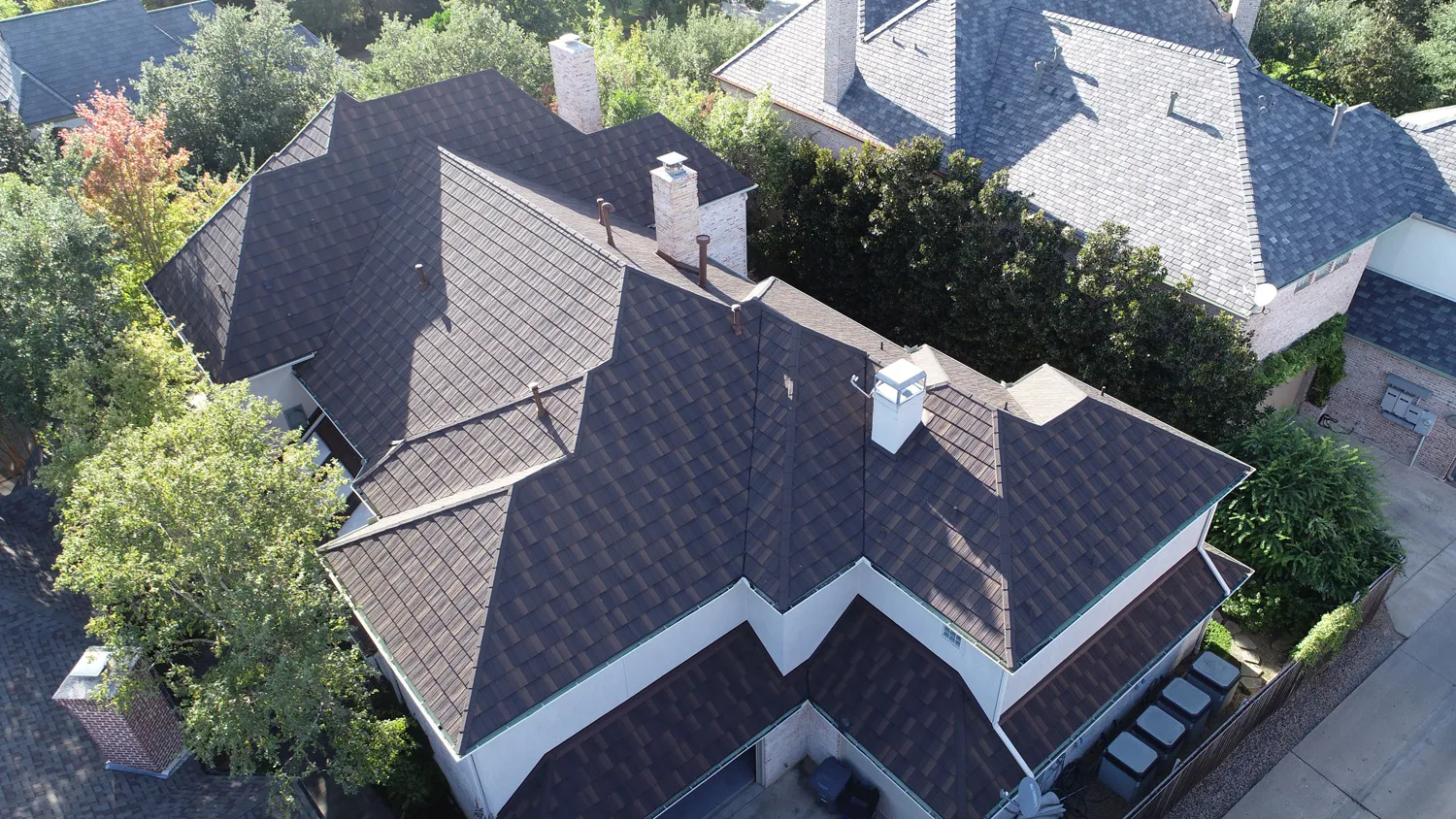 SEO for roofers in Buford — sunrise drone shot of a Lake Lanier corridor roof installation