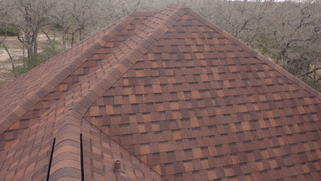 Completed shingle roof on a Milton GA luxury home with manicured landscaping